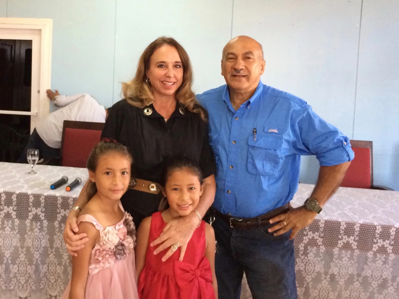 Evelyn Castellar with La Ceiba community representatives and two children