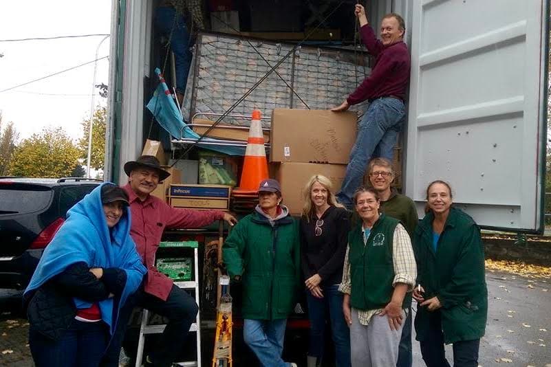 Volunteers preparing donated supplies for shipment