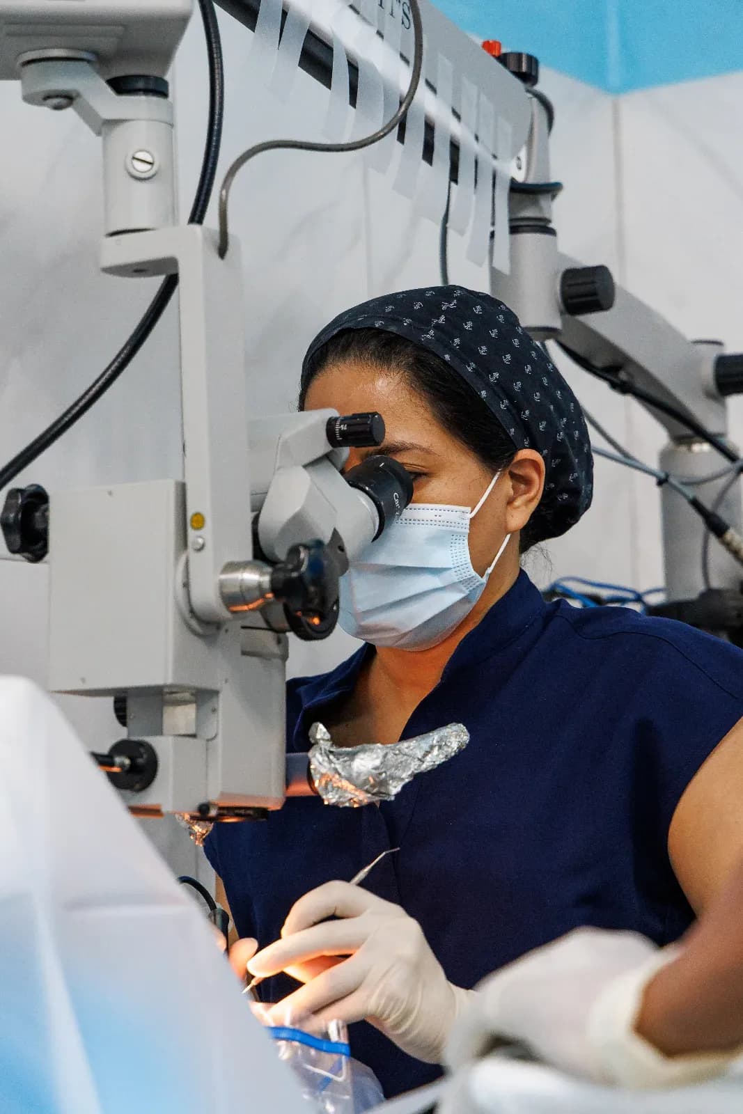 AI placeholder of a volunteer assisting a patient with a vision screening